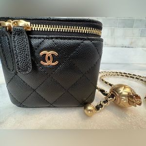 Chanel 2021 Mini Cross Bag. Featuring black caviar leather, interlocking CC logo